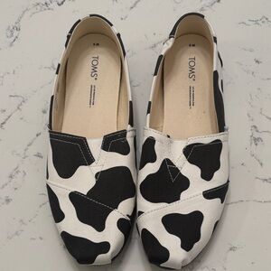 Toms Canvas Slip-On Flats in Black & White Cow Print